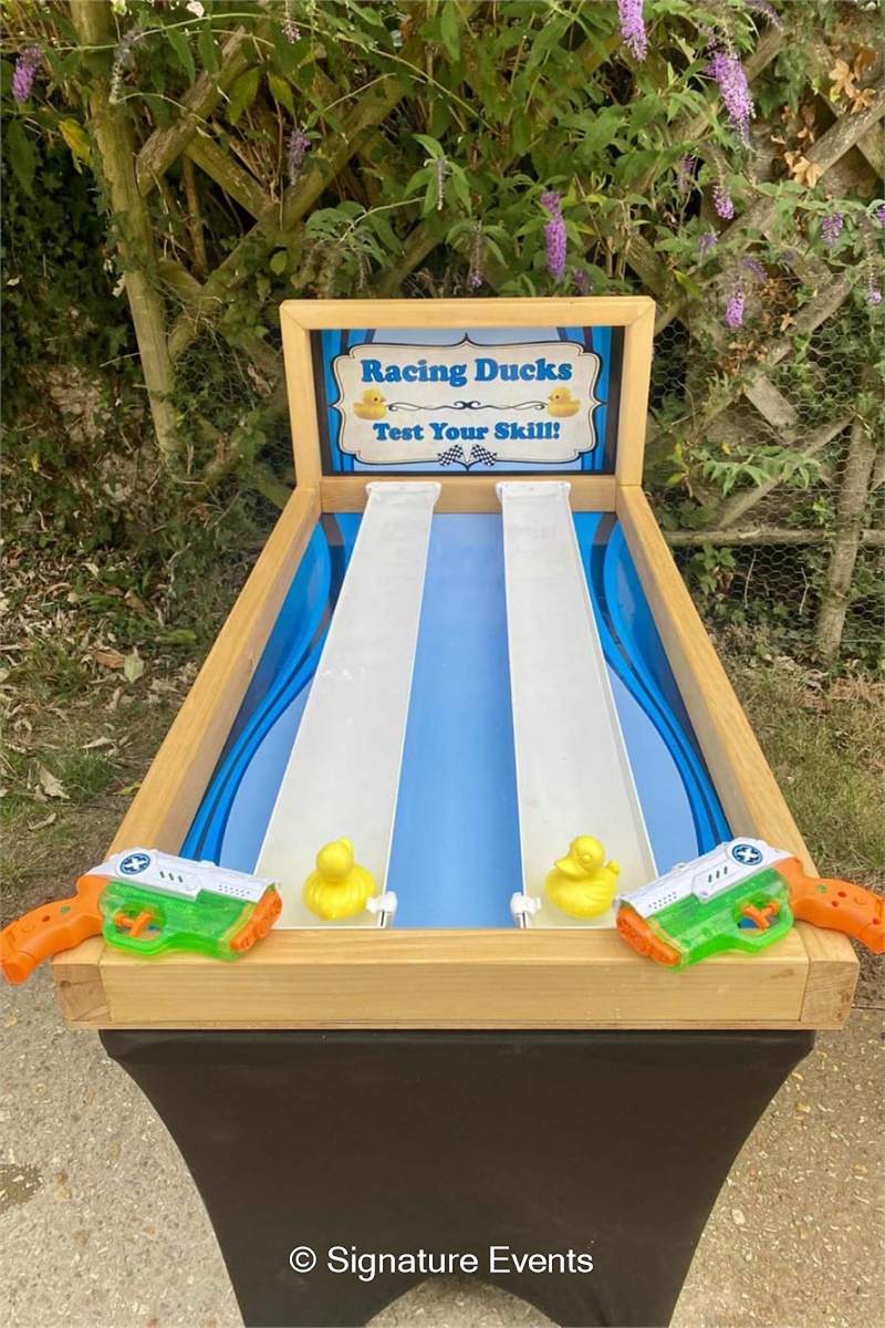 Racing Ducks Game Hire | Water Pistol Carnival Game UK
